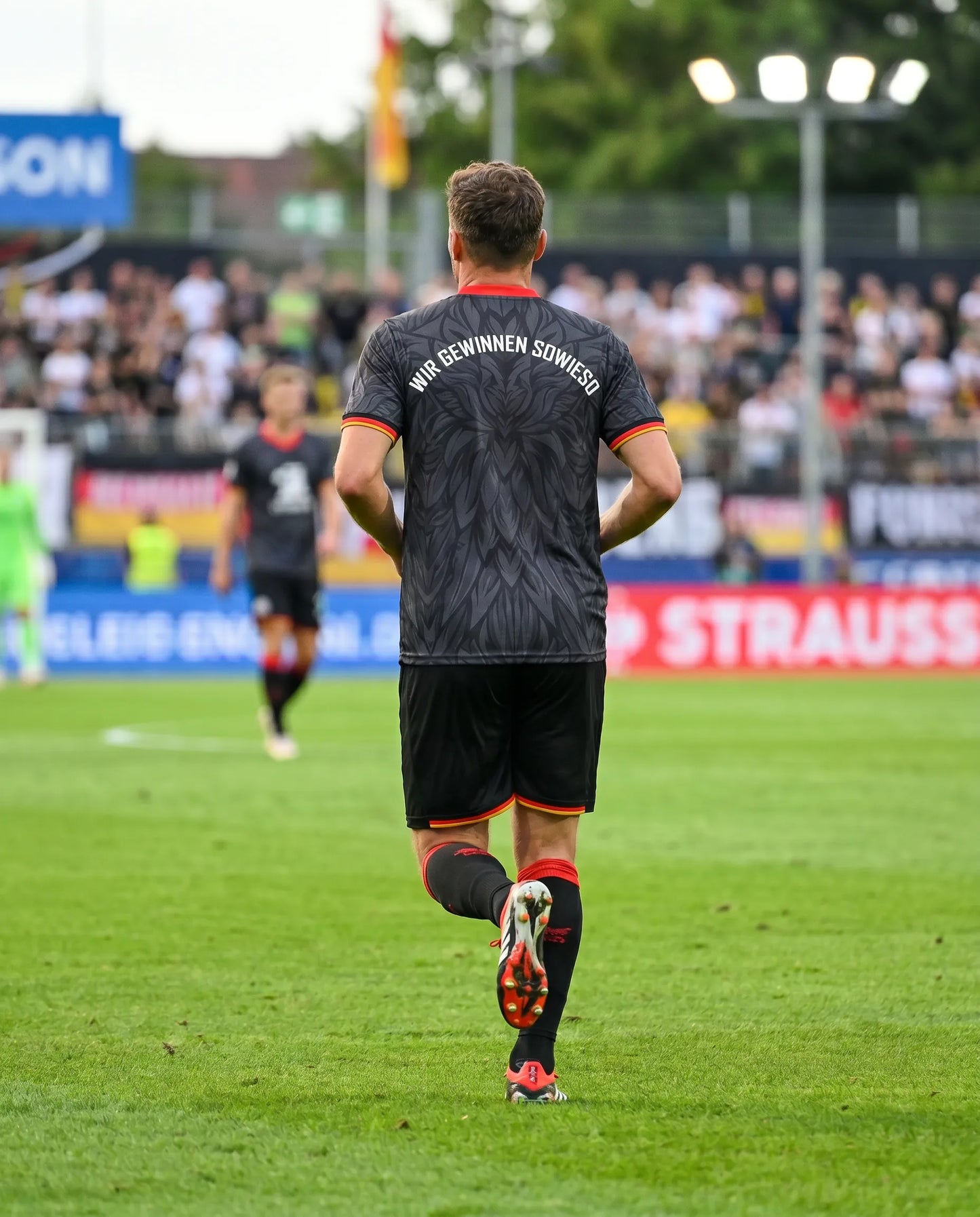 WM Trikot - Adler Deutschland schwarz - Vers. "Wir gewinnen sowieso Rückenprint" Unisex Trikot