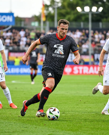 WM Trikot - Adler Deutschland schwarz - Vers. "Wir gewinnen sowieso Rückenprint" Unisex Trikot